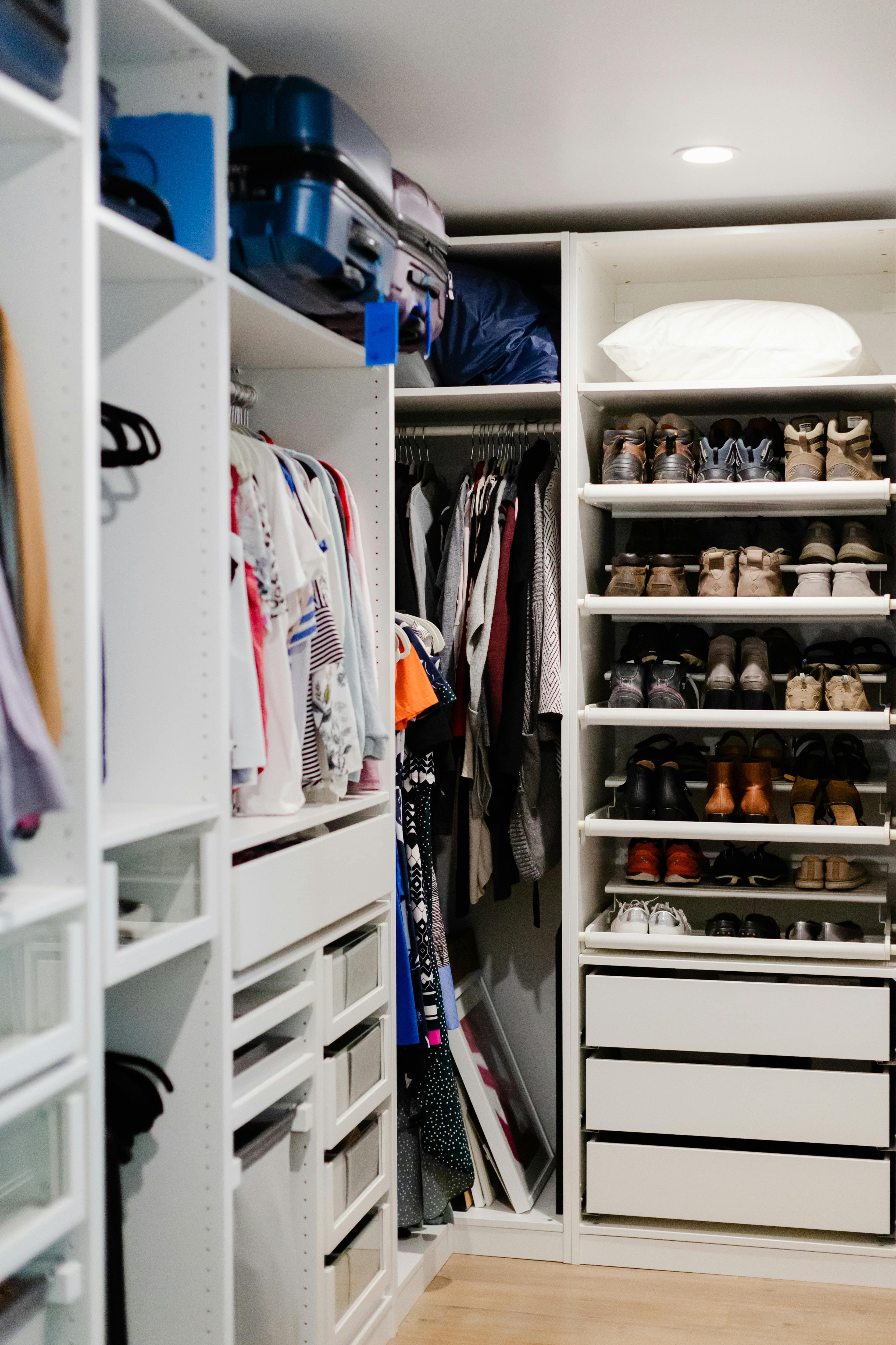 Custom closet organizer with double rods and shelving