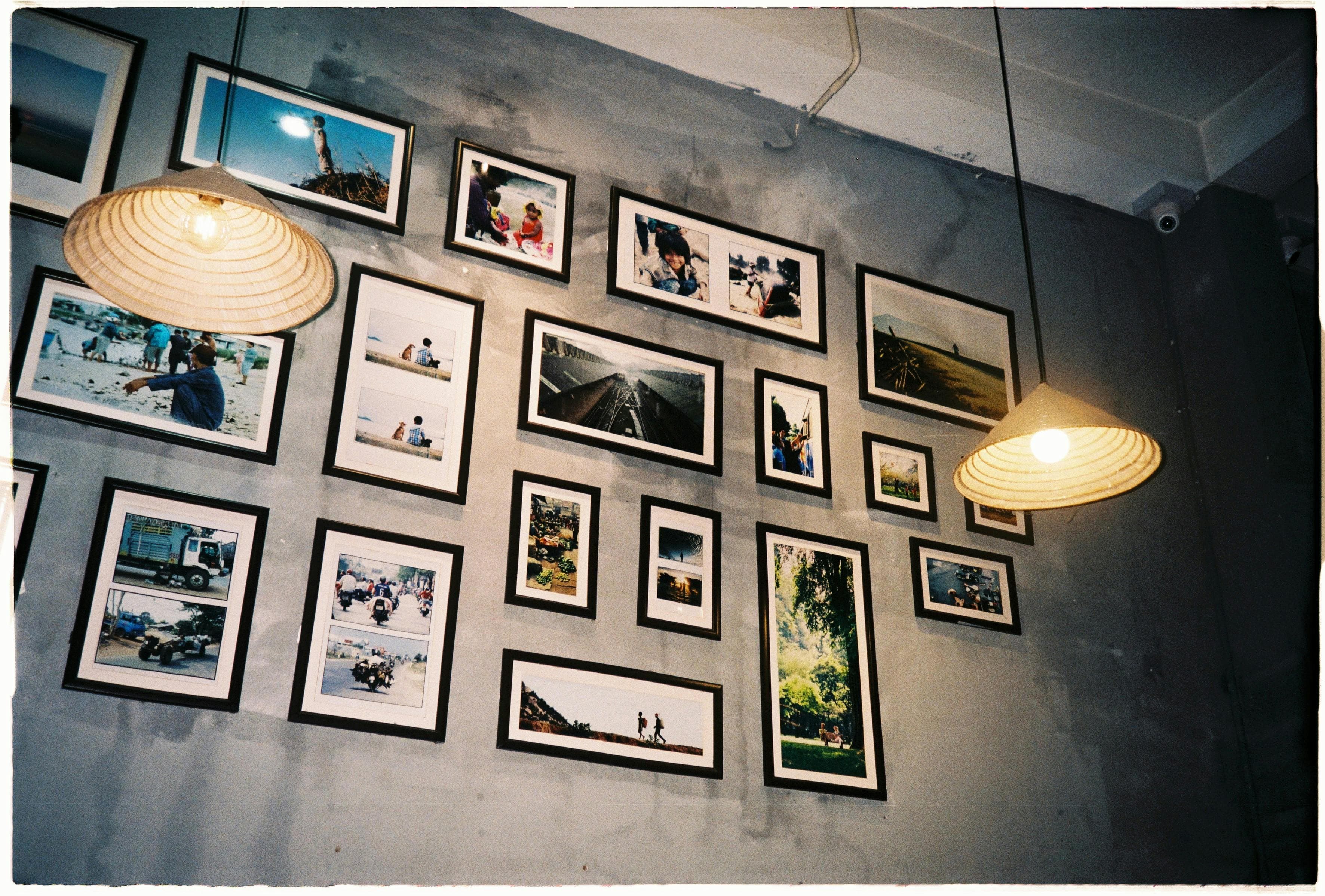 Gallery wall of framed artwork hung on a Rockland County stairway
